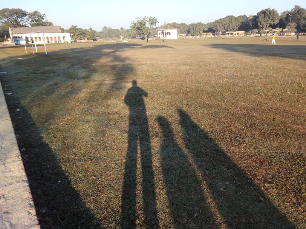 Shadows lengthening on a winter morning on Kosi Club Ground